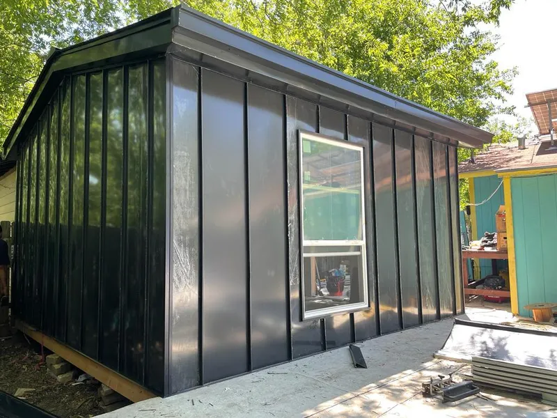 Black standing seam metal wall panels for Metal Roof Installation in Altus