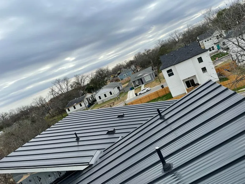 Standing seam metal roof panels with vents for Skylight Repair in Altus